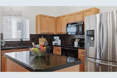 2199 Squawbush Ridge Grove, Colorado Springs, CO 80910 - Photo 15