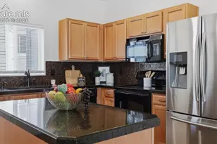 2199 Squawbush Ridge Grove, Colorado Springs, CO 80910 - Photo 15