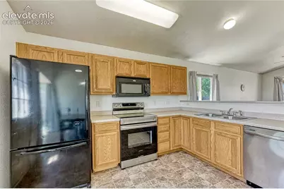 7647 Sailwind Drive, Colorado Springs, CO 80925 - Photo 9