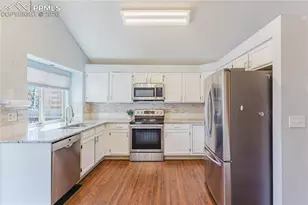 6910 Sproul Ln, Colorado Springs, CO 80918 - Photo 7