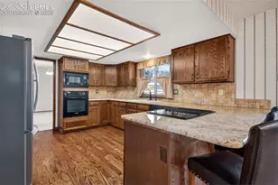 1055 Point of the Pines Dr, Colorado Springs, CO 80919 - Photo 13