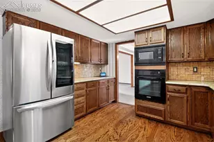 1055 Point of the Pines Dr, Colorado Springs, CO 80919 - Photo 15
