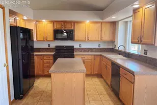 7042 Grand Prairie Dr, Colorado Springs, CO 80923 - Photo 9