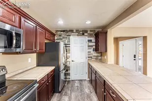 4879 Turning Leaf Way, Colorado Springs, CO 80922 - Photo 11