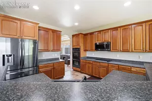 6976 Cobblecreek Dr, Colorado Springs, CO 80922 - Photo 15