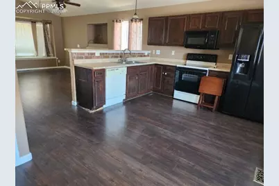 7487 Farmcrest Road, Colorado Springs, CO 80925 - Photo 9