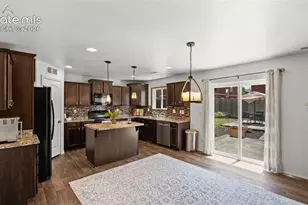 9559 Desert Lily Cir, Colorado Springs, CO 80925 - Photo 7