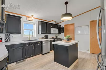 6630 Buckboard Drive, Peyton, CO 80831 - Photo 11