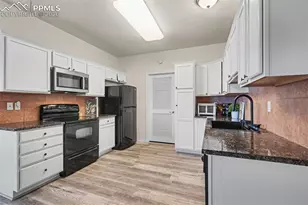 1590 Little Bear Creek Point, Colorado Springs, CO 80904 - Photo 11