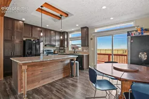 5895 Bar 10 Rd, Colorado Springs, CO 80928 - Photo 7