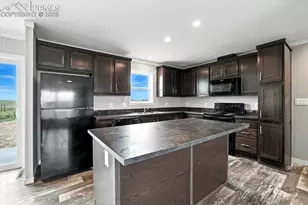 23595 Jayhawk Ave, Colorado Springs, CO 80928 - Photo 9