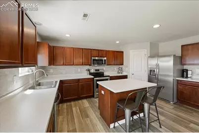 9385 Sand Myrtle Drive, Colorado Springs, CO 80925 - Photo 13