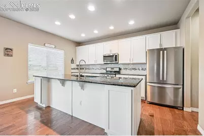 10371 Evening Vista Drive, Peyton, CO 80831 - Photo 7