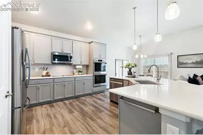 6904 Bigtooth Maple Drive, Colorado Springs, CO 80925 - Photo 3