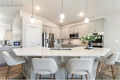 6904 Bigtooth Maple Drive, Colorado Springs, CO 80925 - Photo 5