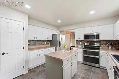 6907 Shimmering Leaf Road, Colorado Springs, CO 80908 - Photo 11