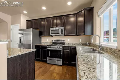 6718 Liberator Trail, Colorado Springs, CO 80925 - Photo 11