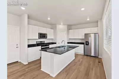 10753 Rolling Ranch Drive, Peyton, CO 80831 - Photo 7