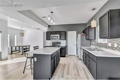 10660 Deer Meadow Circle, Colorado Springs, CO 80925 - Photo 13