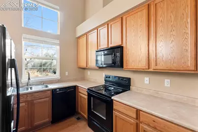 2020 Squawbush Ridge Grove, Colorado Springs, CO 80910 - Photo 7