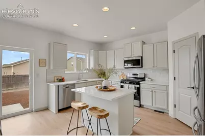 6733 Liberator Trail, Colorado Springs, CO 80925 - Photo 15