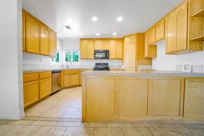 11221 Omelveny Road, Oak Hills, CA 92344 - Photo 13