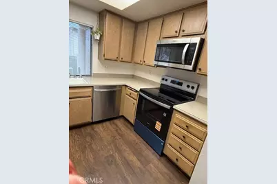 8788 Coral Springs Court #206C, Huntington Beach, CA 92646 - Photo 1