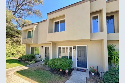 245 N Singingwood Street #11, Orange, CA 92869 - Photo 1