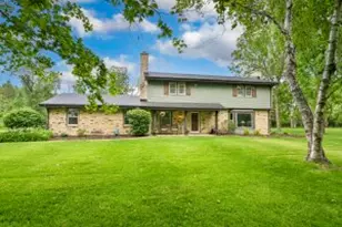 10848 N Pebble Ln, Mequon, WI 53092 - Photo 1