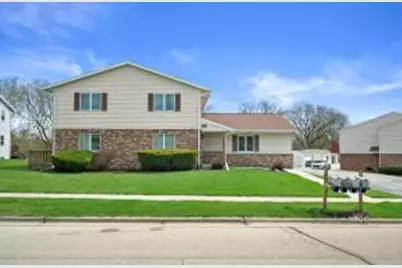 1605  Vogt Dr, West Bend, WI 53095 - Photo 1