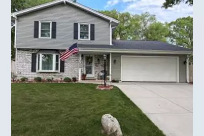 1009  Canterbury Ln, Waukesha, WI 53188 - Photo 1