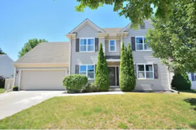 1525  Whitewater Dr, West Bend, WI 53095 - Photo 1