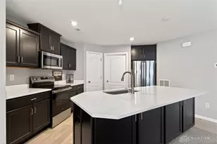 1687 S Golden Clove Bnd, Sugarcreek Twp, OH 45459 - Photo 7