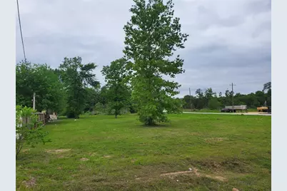 24 County Road 3555, Cleveland, TX 77327 - Photo 1