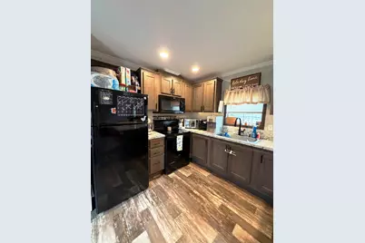 14 Hilltop Manor Mobile Home Park, Littleton, NH 03561 - Photo 13