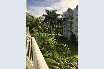 498 NW 165th St Rd #D401, Miami, FL 33169 - Photo 1