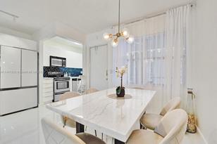 300 Golden Isles Dr, Hallandale Beach, FL 33009 - Photo 5