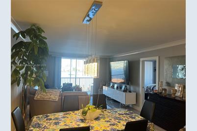 410 Golden Isles Dr #202, Hallandale Beach, FL 33009 - Photo 5