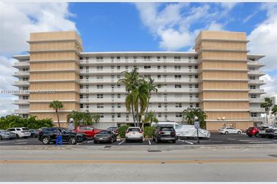 410 Golden Isles Dr #202, Hallandale Beach, FL 33009 - Photo 1