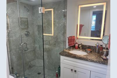 410 Golden Isles Dr #202, Hallandale Beach, FL 33009 - Photo 13