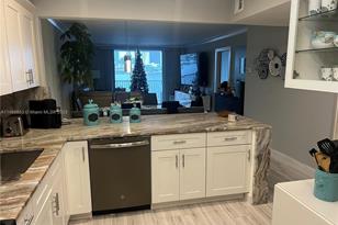 410 Golden Isles Dr, Hallandale Beach, FL 33009 - Photo 9