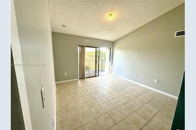 7195 NW 179th St #311 - Photo 1