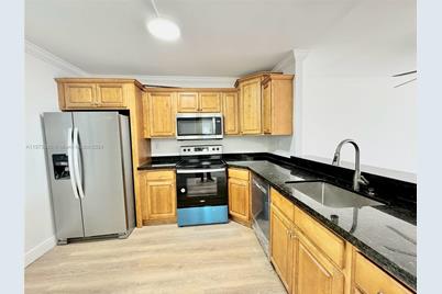 100 NW 76th Ave #208-2 - Photo 1