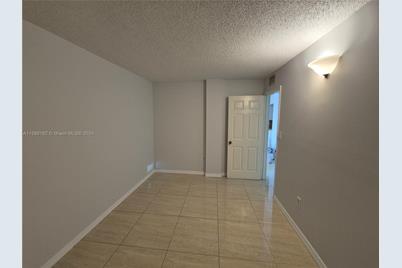 6990 NW 186th St #4-411 - Photo 1