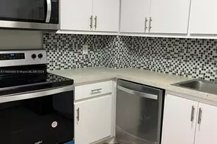 401 Golden Isles Dr, Hallandale Beach, FL 33009 - Photo 5