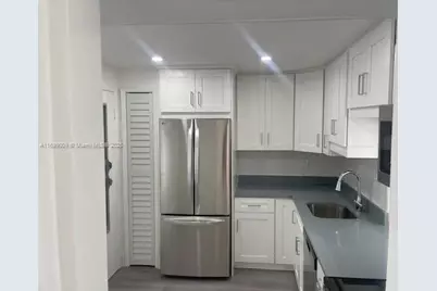 1350 NE 191st St #B203, Miami, FL 33179 - Photo 1