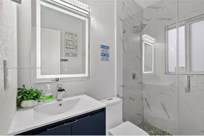 231 NW 44th St, Miami, FL 33127 - Photo 23