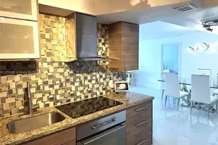 427 Golden Isles Dr, Hallandale Beach, FL 33009 - Photo 1