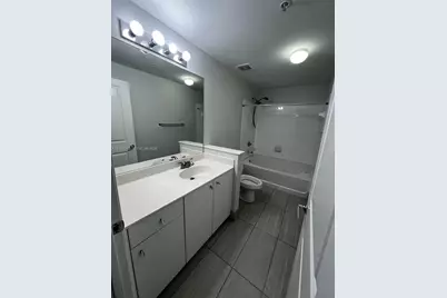 5900 W Sample Rd #303, Coral Springs, FL 33067 - Photo 3
