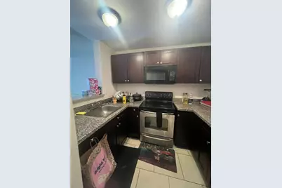 482 NW 165th St Rd #A203, Miami, FL 33169 - Photo 1
